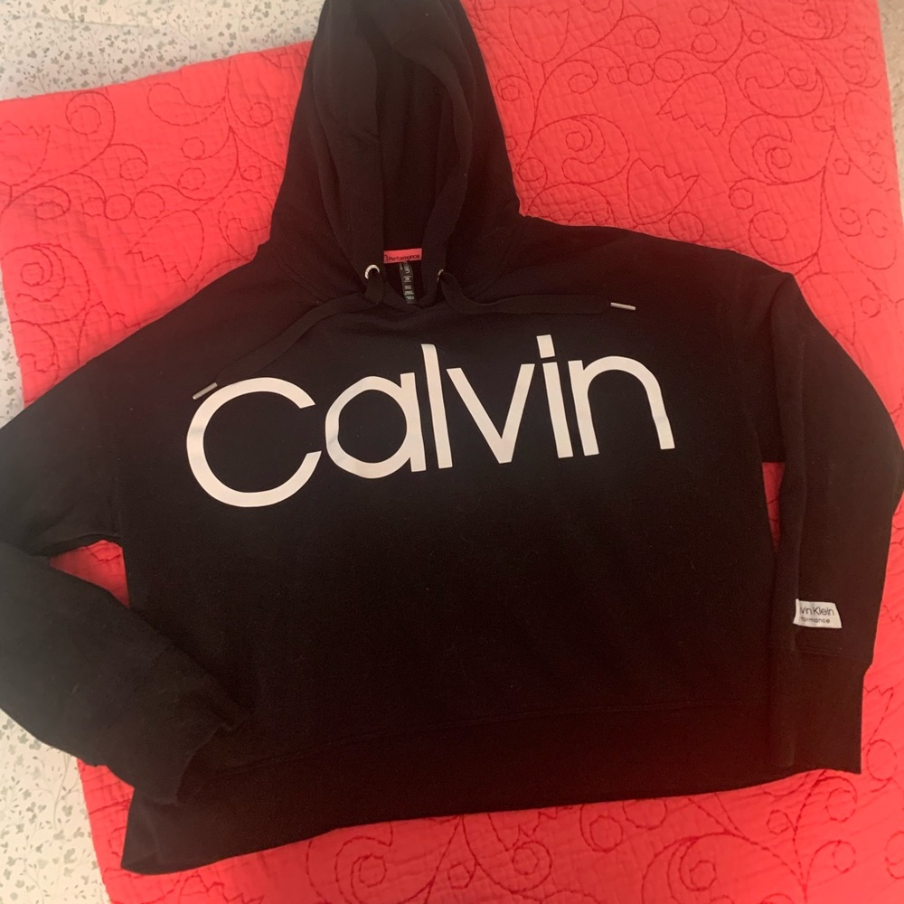 Hooded Black over head sweatshirt lightly worn Calvin Klein